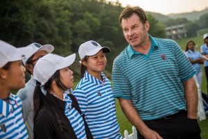 Partcipants attend the clinic by Sir Nick Faldo during day one of the 10th Faldo Series Asia Grand Final at Faldo course in Shenzhen, China. Photo by Xaume Olleros.
